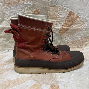 Red leather Converse High Tops